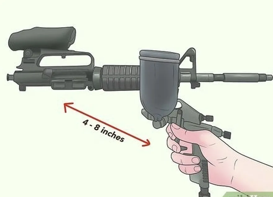 Passo 10 Segure o bico de pulverização a uma distância de 10,2 a 20,3 cm (4 a 8 polegadas) das peças e pulverize o Duracoat com passagens rápidas da esquerda para a direita.