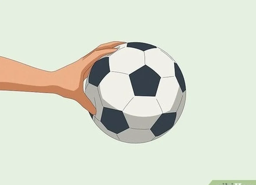 Etapa 4 Pegue uma bola de futebol (não muito cheia) e comece a praticar o malabarismo.