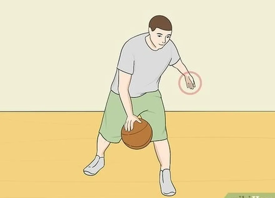 Driblar uma bola de basquete entre as pernas Passo 12.jpeg