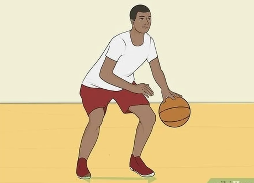 Driblar uma bola de basquete entre as pernas Passo 6.jpeg