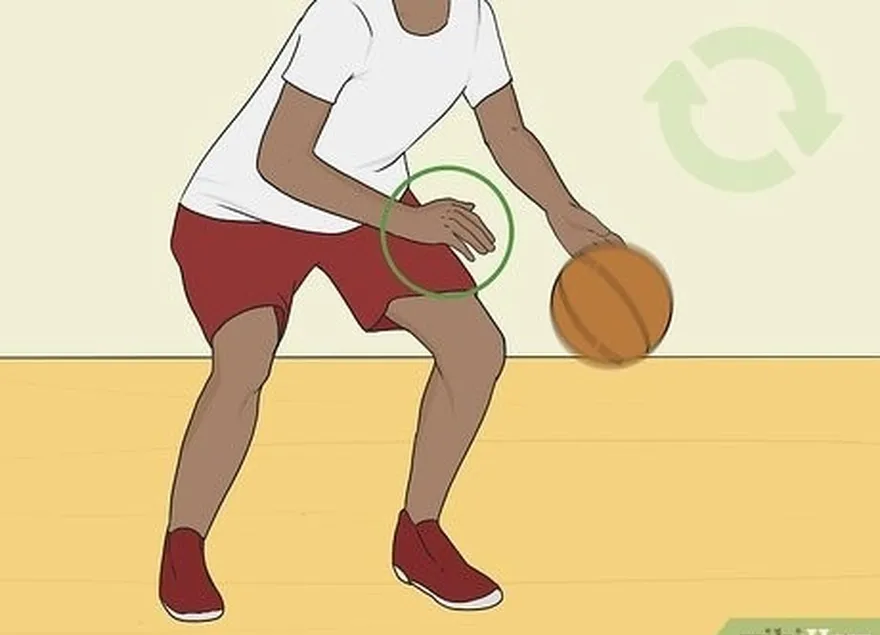 Driblar uma bola de basquete entre as pernas Passo 9.jpeg