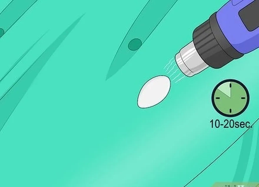 Etapa 4 Coloque o plástico sobre o dano e continue aquecendo-o por 10 a 20 segundos.