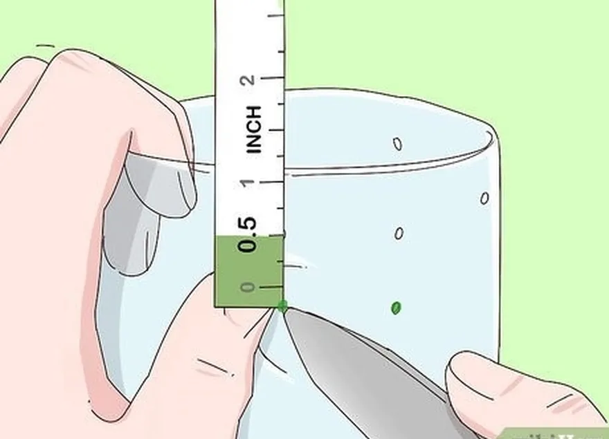 Etapa 3 Faça mais dois furos cerca de 1,3 cm (0,5 pol.) abaixo dos primeiros.