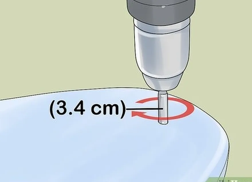 Passo 1 Faça um furo para o tampão da trela com uma broca de 1,33 polegadas (3,4 cm) de diâmetro.