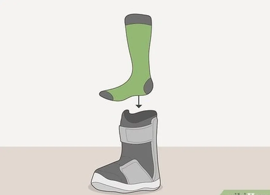 Etapa 4 Coloque itens macios em suas botas ou fixações de snowboard.