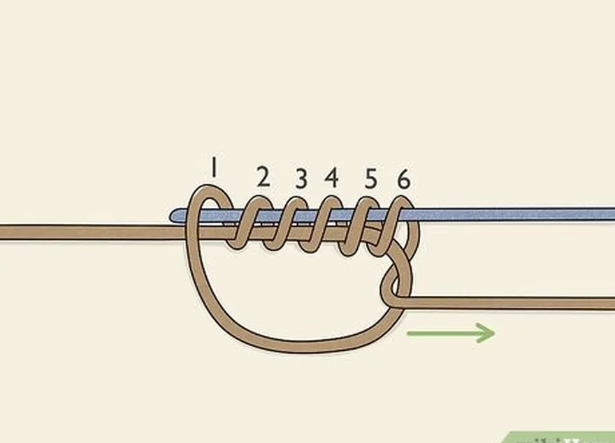 Etapa 3 Enrole a extremidade da linha com o laço 6 vezes através do laço ao redor das 2 linhas.