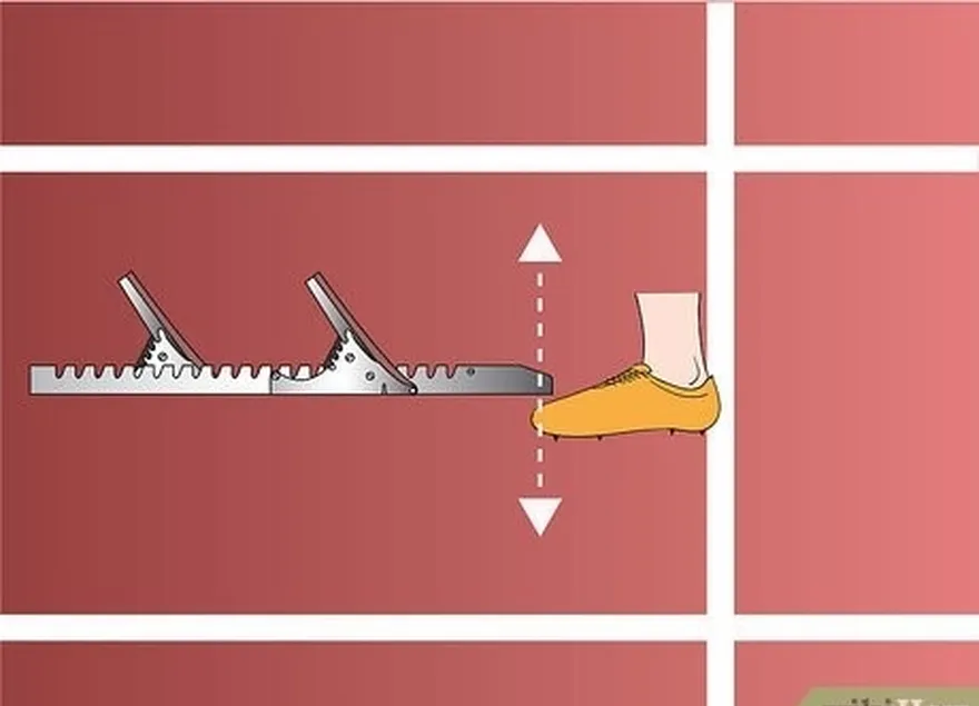 etapa 4 posicione os blocos firmemente na pista em seu dedo do pé (a peça plana de metal na ponta do corpo principal).